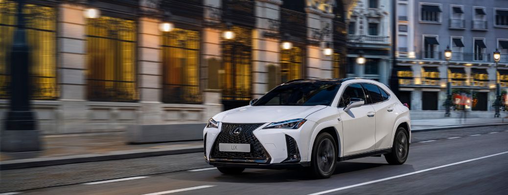 2024 Lexus UX 250h White driving on the road